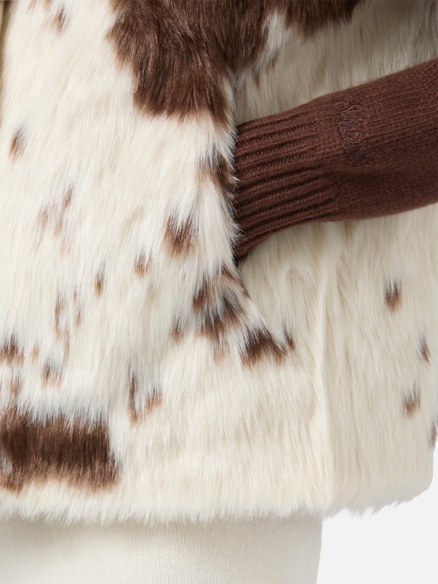 Ambre faux-fur gilet with cow print