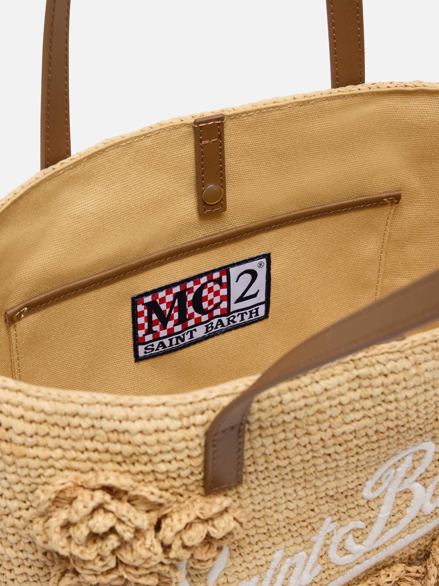 Beigefarbene Tasche City Mid aus Raffiabast mit Blumen-Applikationen