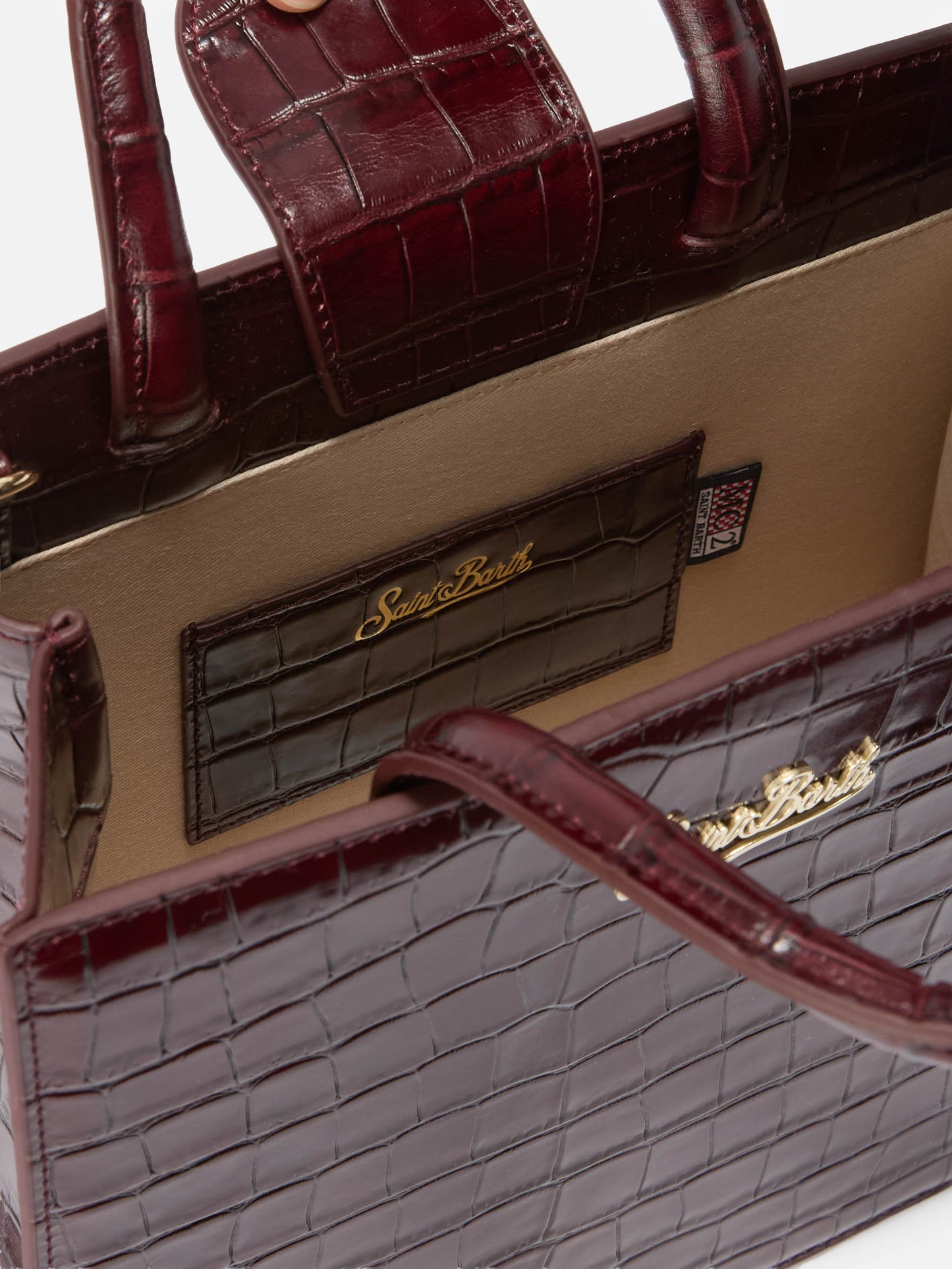 Shop Bag Midi Handbag in burgundy crocodile-print leather