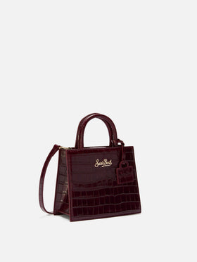 Shop Bag Mini Handbag in burgundy crocodile-print leather