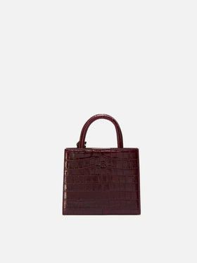 Shop Bag Mini Handbag in burgundy crocodile-print leather