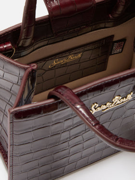 Shop Bag Mini Handbag in burgundy crocodile-print leather