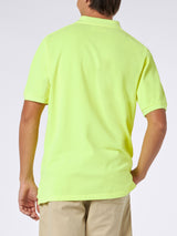 Polo da uomo in piquet giallo fluo con logo St. Barth ed effetto vintage