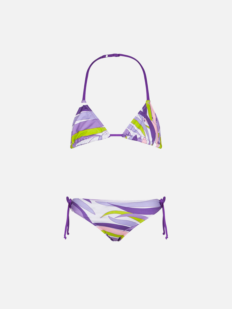 Girl triangle bikini with palms leaves