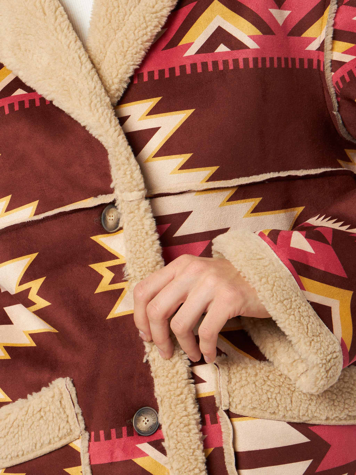 Beiger wendbarer Dorys-Mantel aus Shearling mit Ethno-Muster 