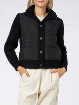 Woman  padded jacket with knitted sleeves