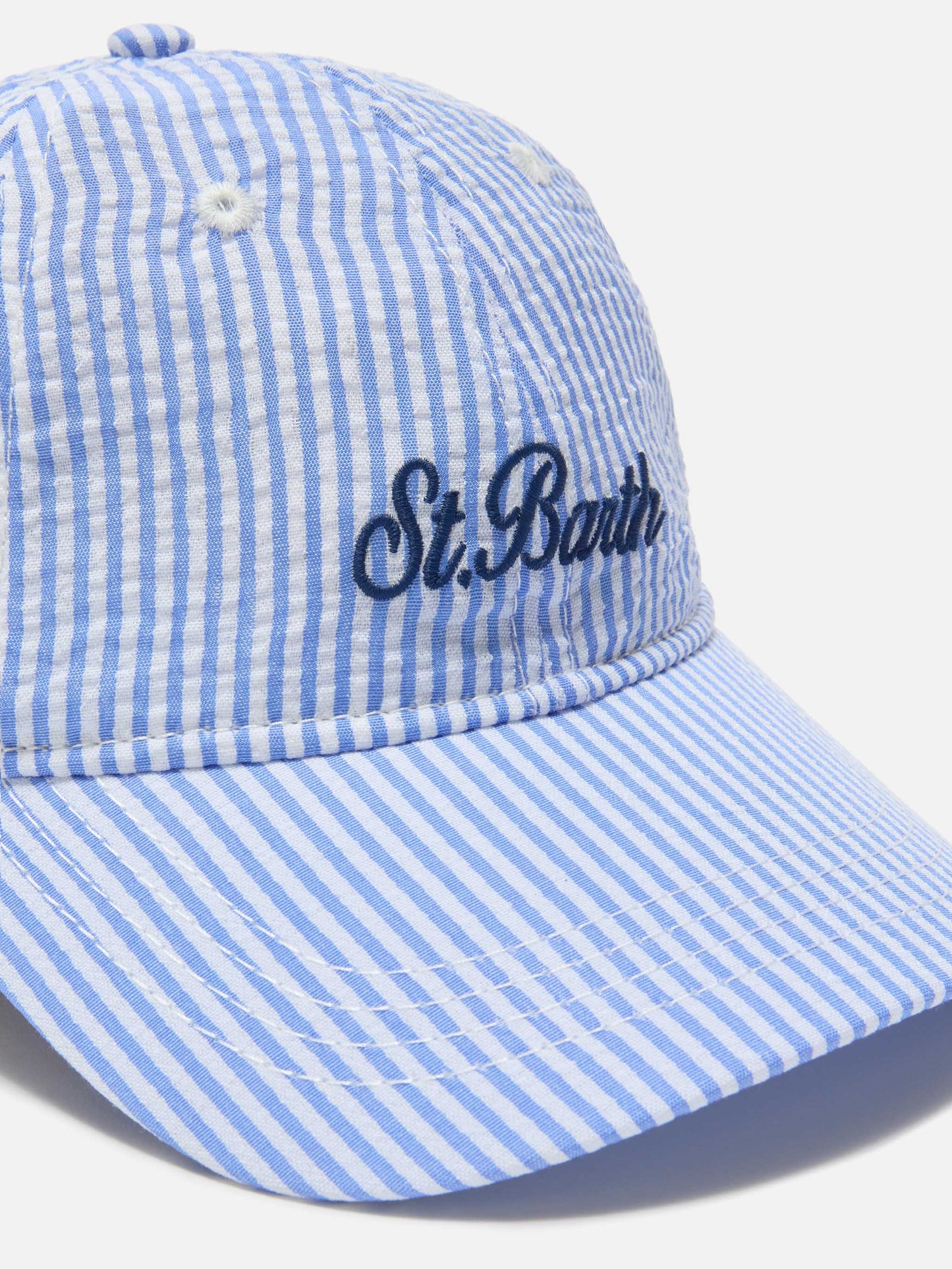 Cappellino Baseball con visiera in cotone seersucker a righe azzurre e bianche