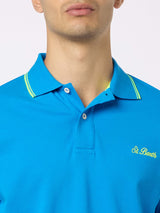 Herren-Poloshirt Beverly Hills aus blauem Baumwoll-Piqué mit Palmenstickerei