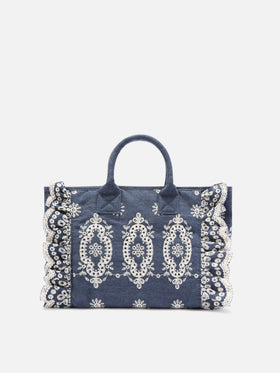 Colette Volant bag in dark wash denim with decorative embroidery