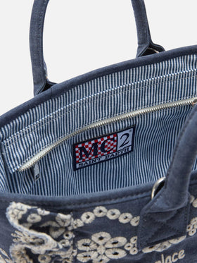 Colette Volant bag in dark wash denim with decorative embroidery