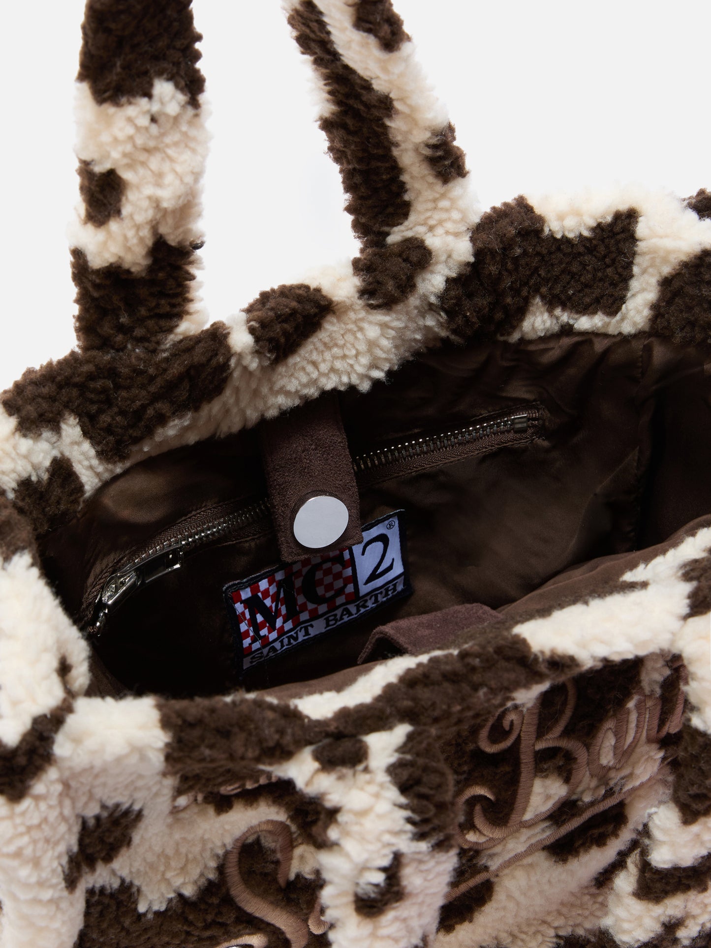 Colette Teddy Handbag in cow-print sherpa