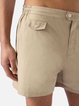 Capferrat swim shorts in solid beige with embroidered logo