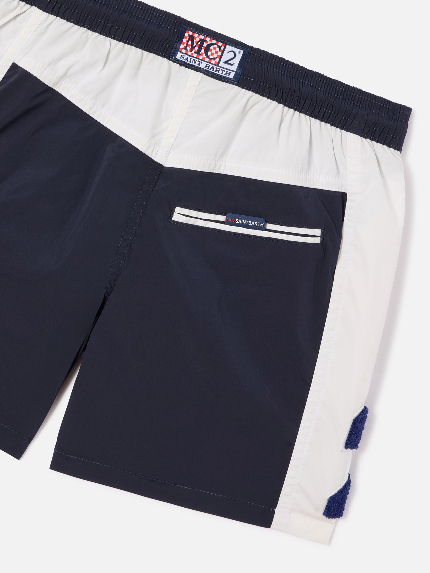 Bañador short Cup Jr con bandas y parche 