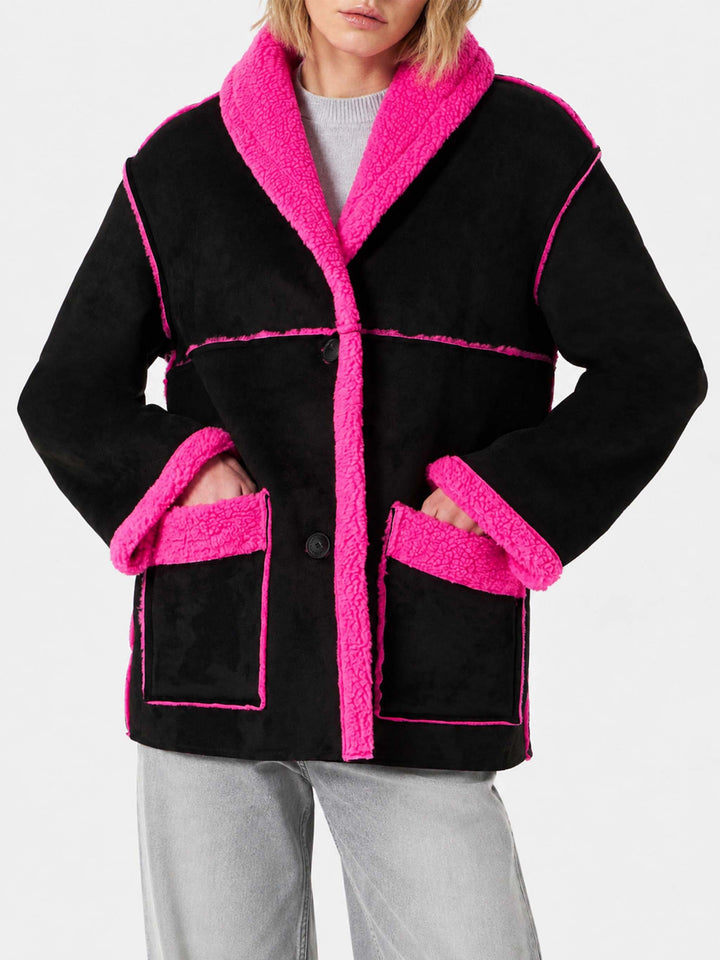 Manteau réversible en shearling Dorys noir et rose fluo 