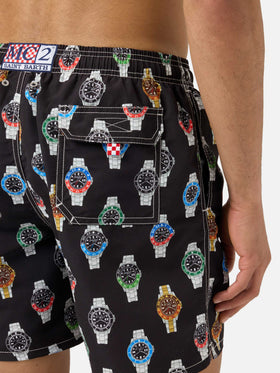 Gustavia swim shorts in solid black with watch print