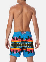 Man mid-length Gustavia swim-shorts with palms landscape placed print  |  AI CO-CREATED DESIGN BY RICKDICK - POWERED BY RED-EYE