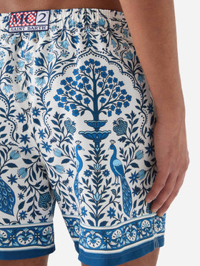 Gustavia white swim shorts with contrasting peacock print