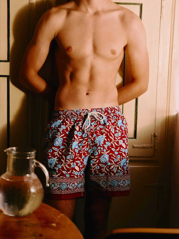 Bañador corto Gustavia burdeos con estampado floral 