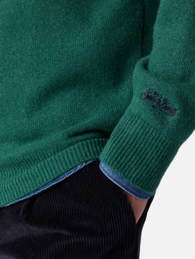 Green sweater Heron with Non sarà un'avventura embroidery