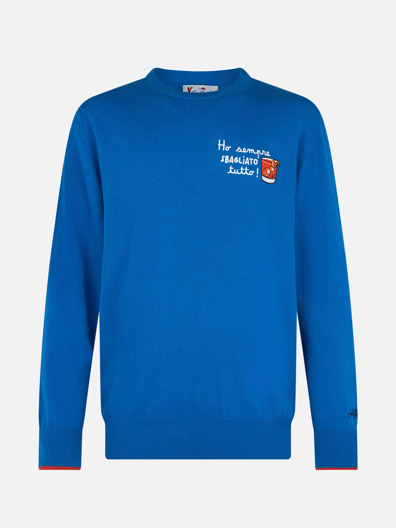 Herren-Skipullover Heron in Blau mit Stickerei „Ho sempre sbagliato tutto“.