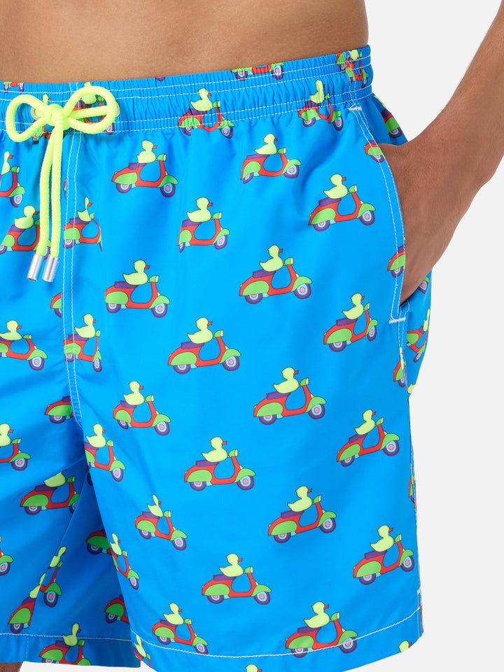 Blue swim shorts with ducks on scooters print | Special Edition