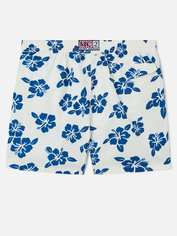 White Lighting swim shorts with all-over hibiscus print
