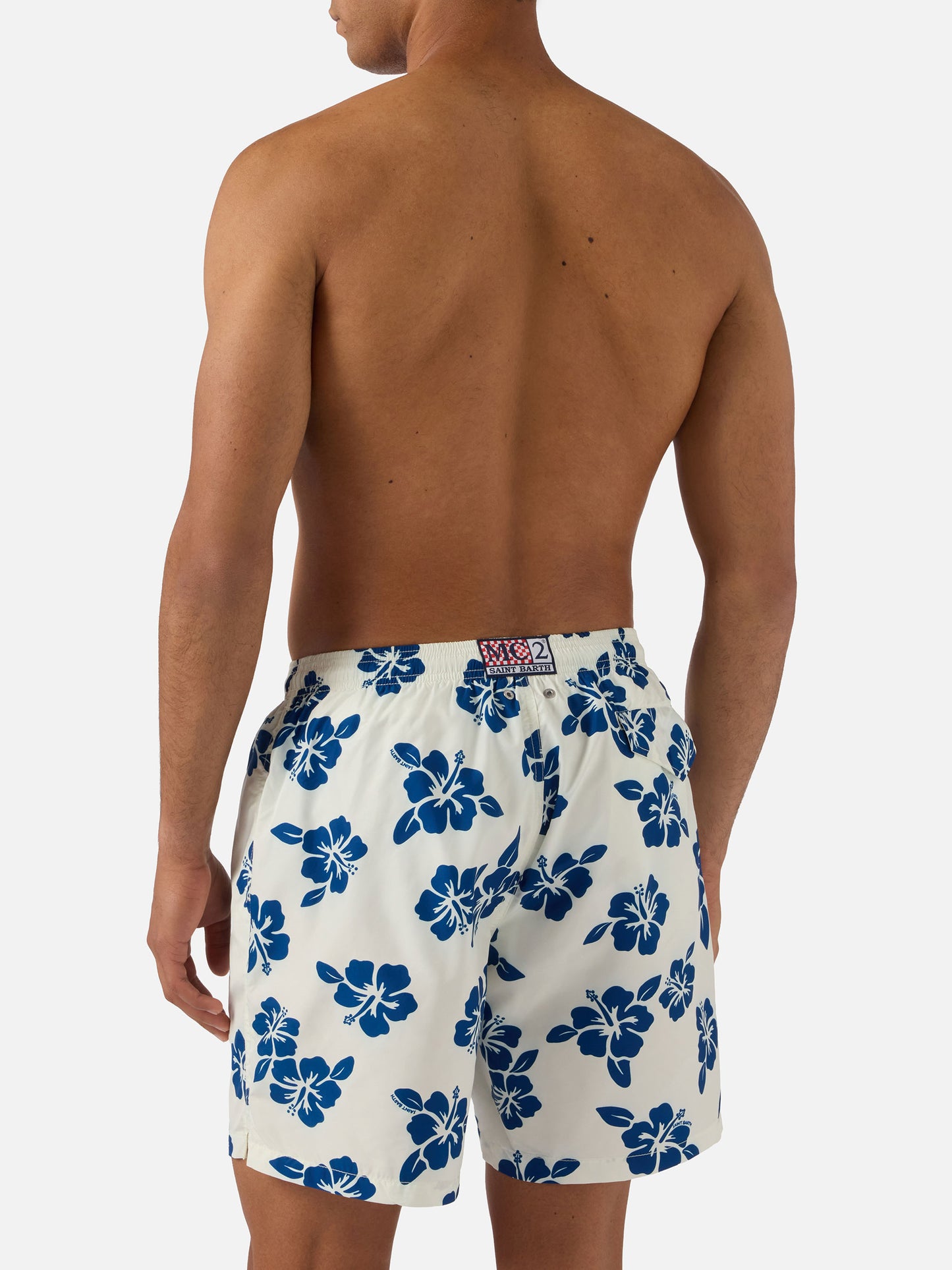 White Lighting swim shorts with all-over hibiscus print
