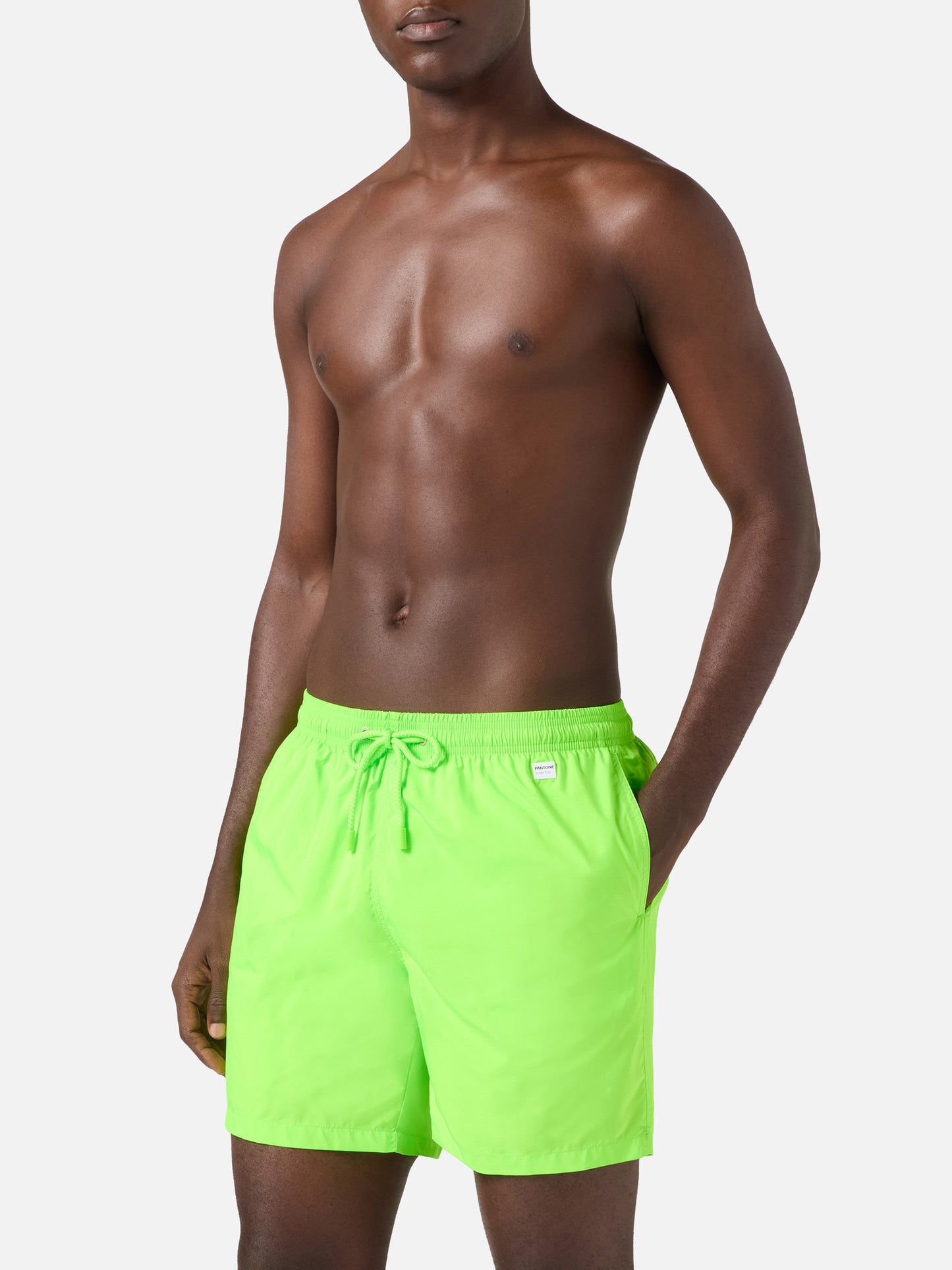 Lighting Pantone swim shorts in solid fluo green | Special Edition