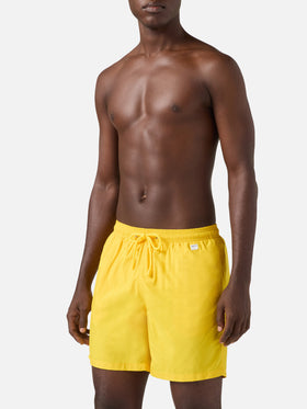 Lighting Pantone swim shorts in solid yellow | Special Edition