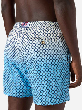 Lighting Micro swim shorts with geometric print on shaded background