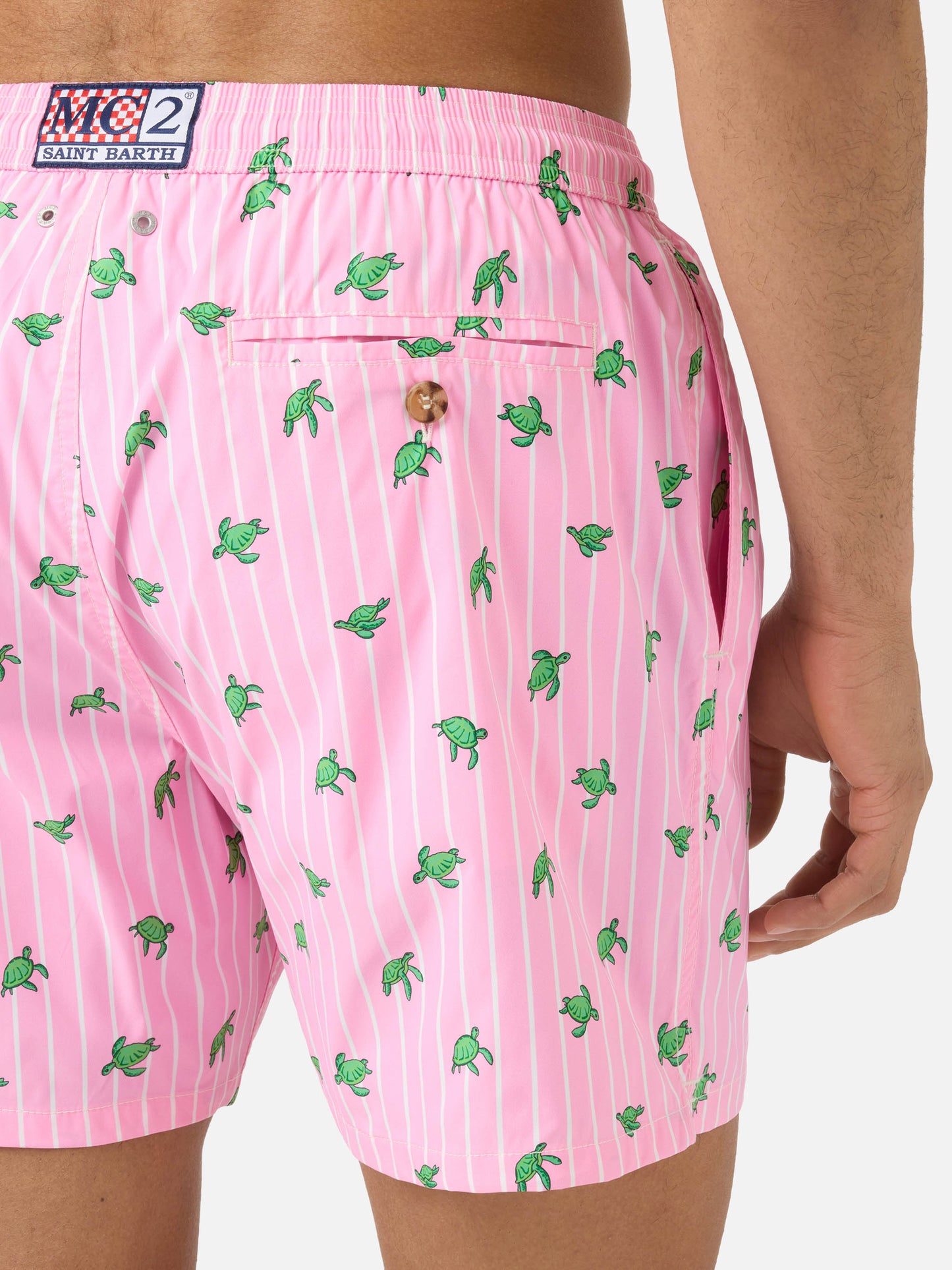 Pink striped Lighting Micro swim shorts with all-over turtle print