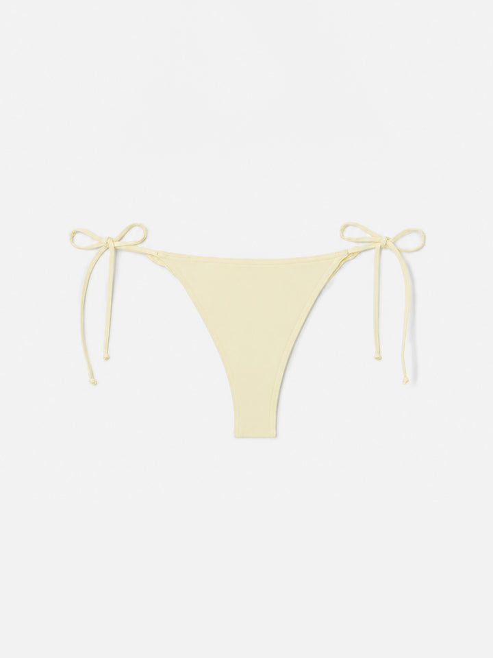 Bas de bikini Marielle Brazilian à nouer sur les côtés en coloris butter uni 