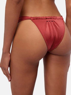 Norah slip mare cheeky con stampa cow skin - Gaia top bralette triangolo rosso mattone shimmer