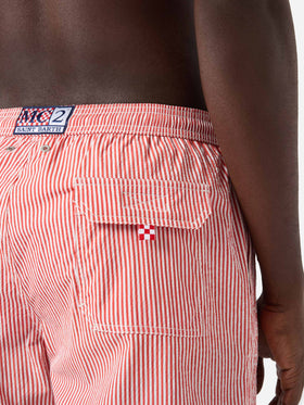 Patmos seersucker striped swim shorts in red and white