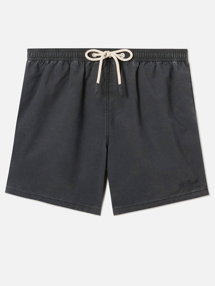 Patmos swim shorts in black with used effect and logo embroidery