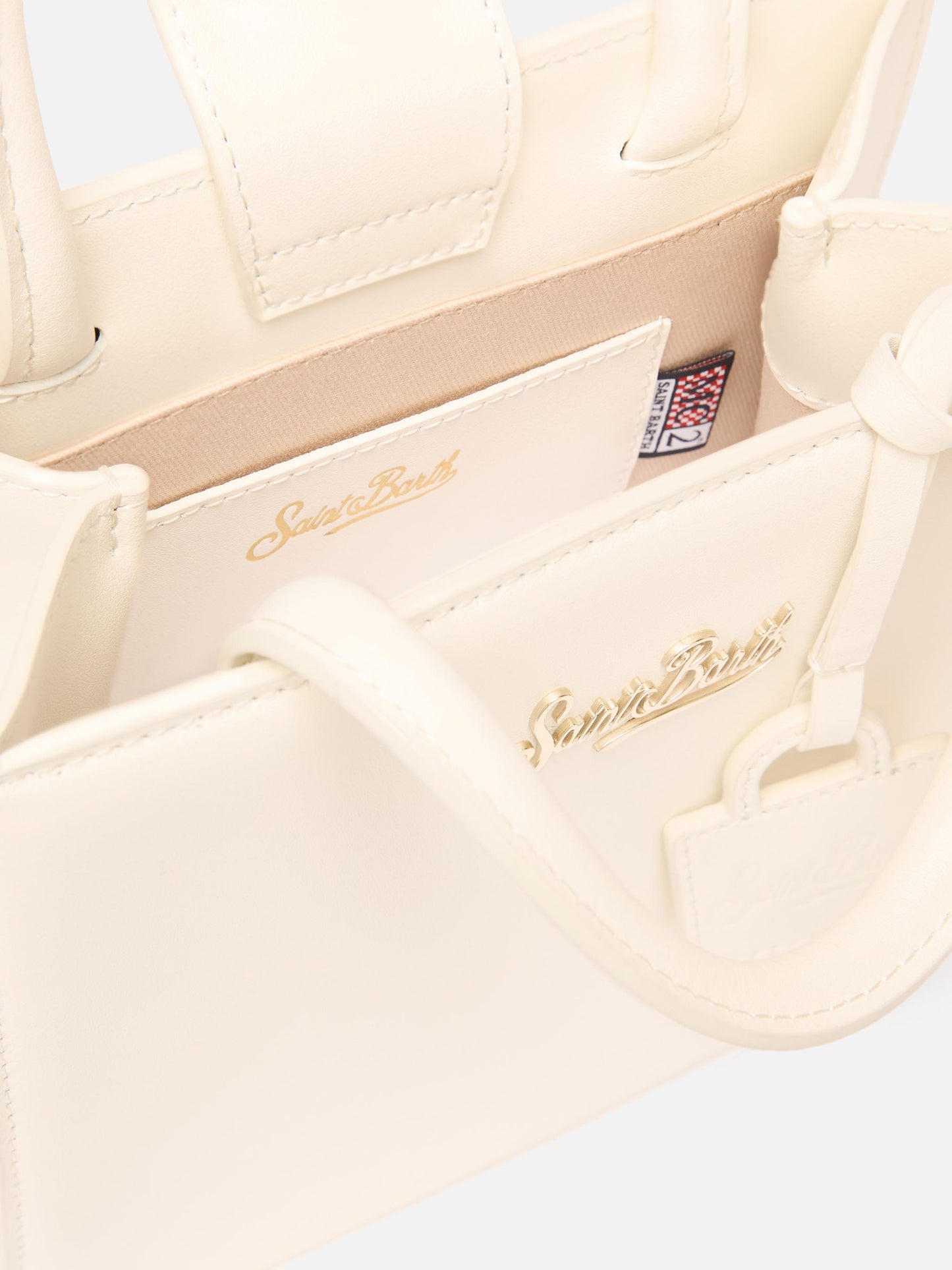 Structured Shop mini bag in white smooth leather with metal tag