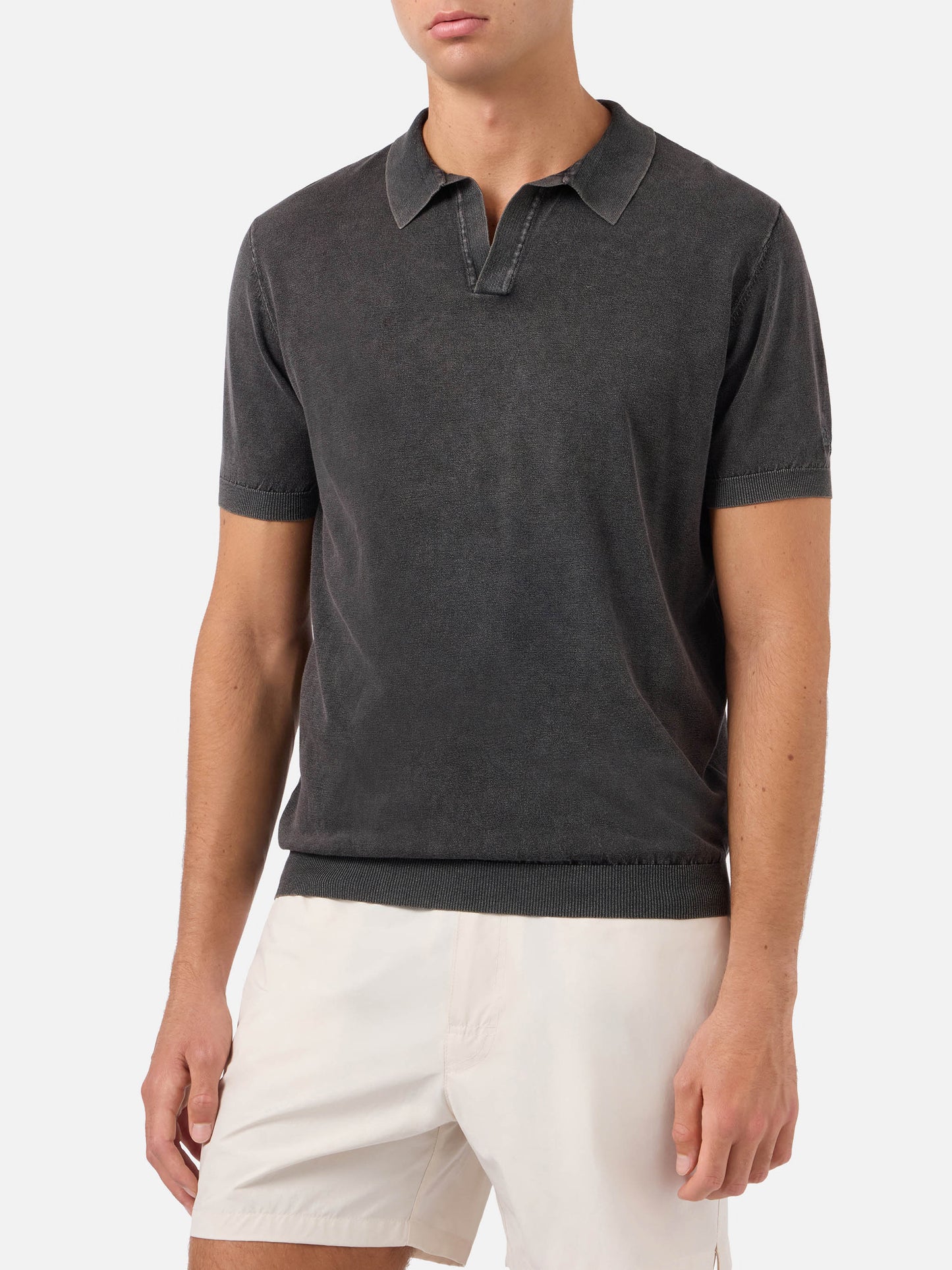 Schwarzes gestricktes Poloshirt Sloan ohne Knöpfe mit Vintage-Behandlung 