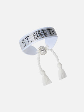 White fabric bracelet with St. Barth beaded lettering