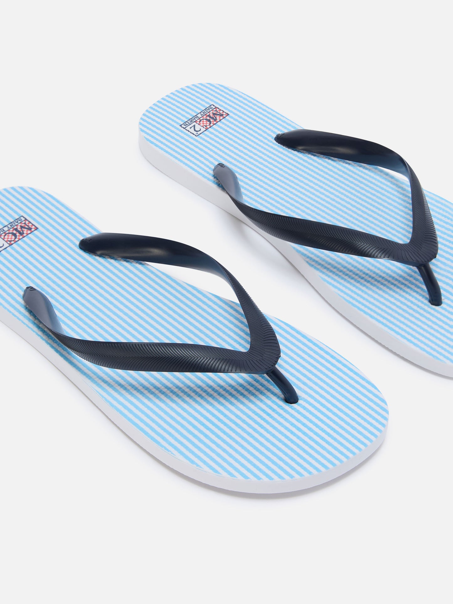Tommy Flip-Flops zum Hineinschlüpfen aus Gummi mit hellblauen Streifen 