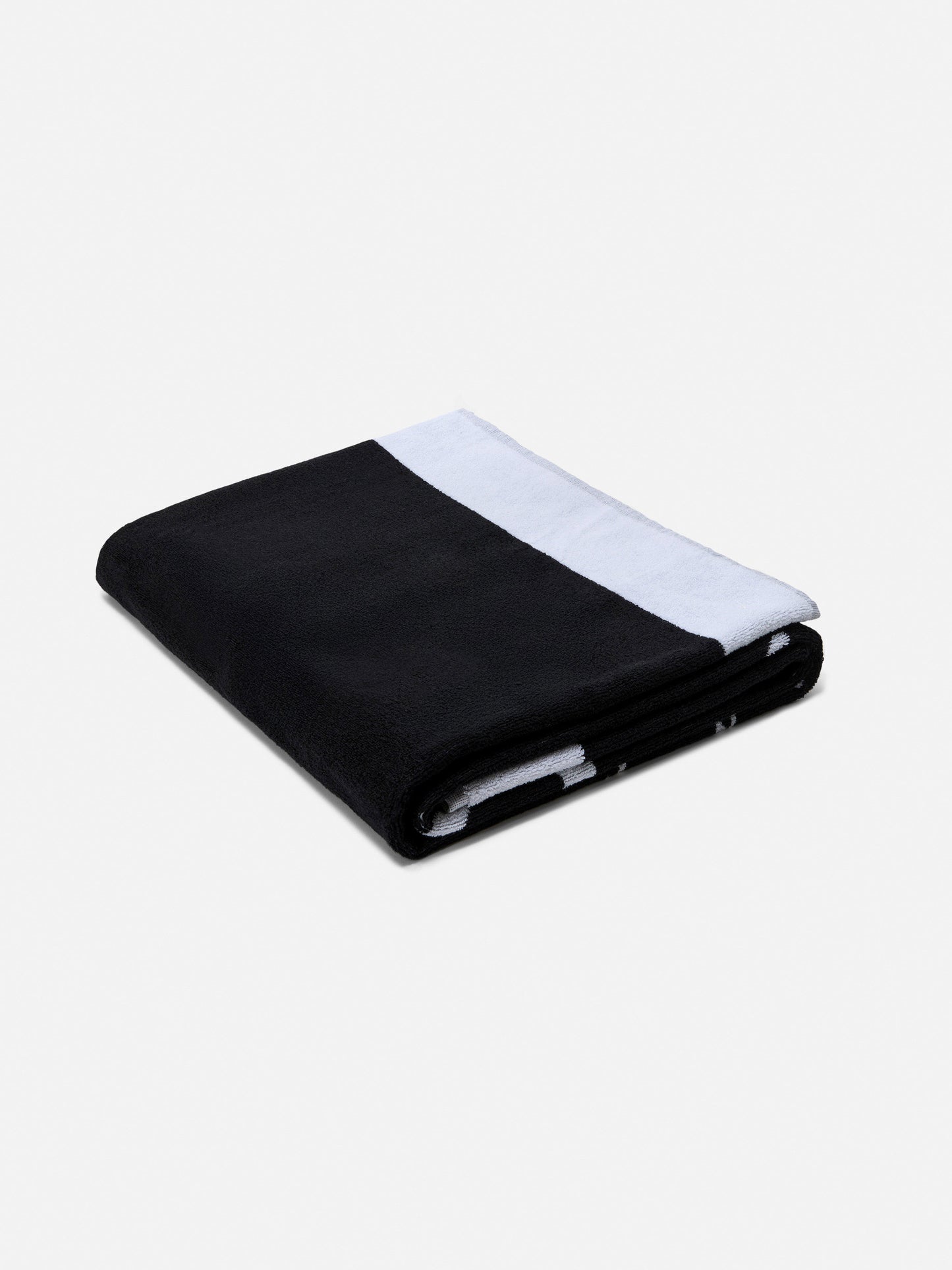 Telo mare nero in spugna con bordo bianco