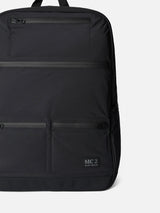 Black nylon backpack with zipped pockets