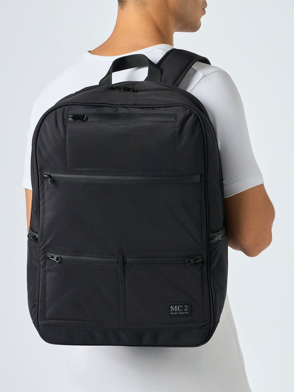 Black nylon backpack with zipped pockets