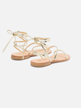 Essentials real laminated leather flip flops in gold