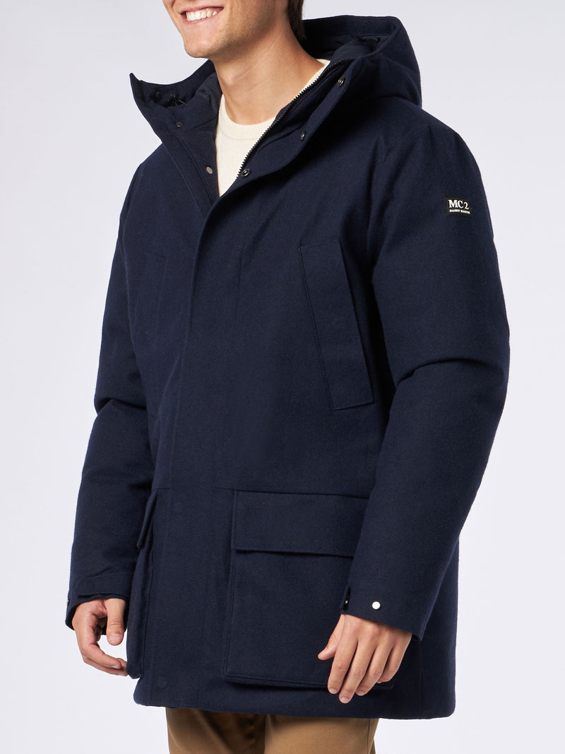 Man hooded blue parka jacket