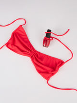 Woman fluo red bandeau bikini