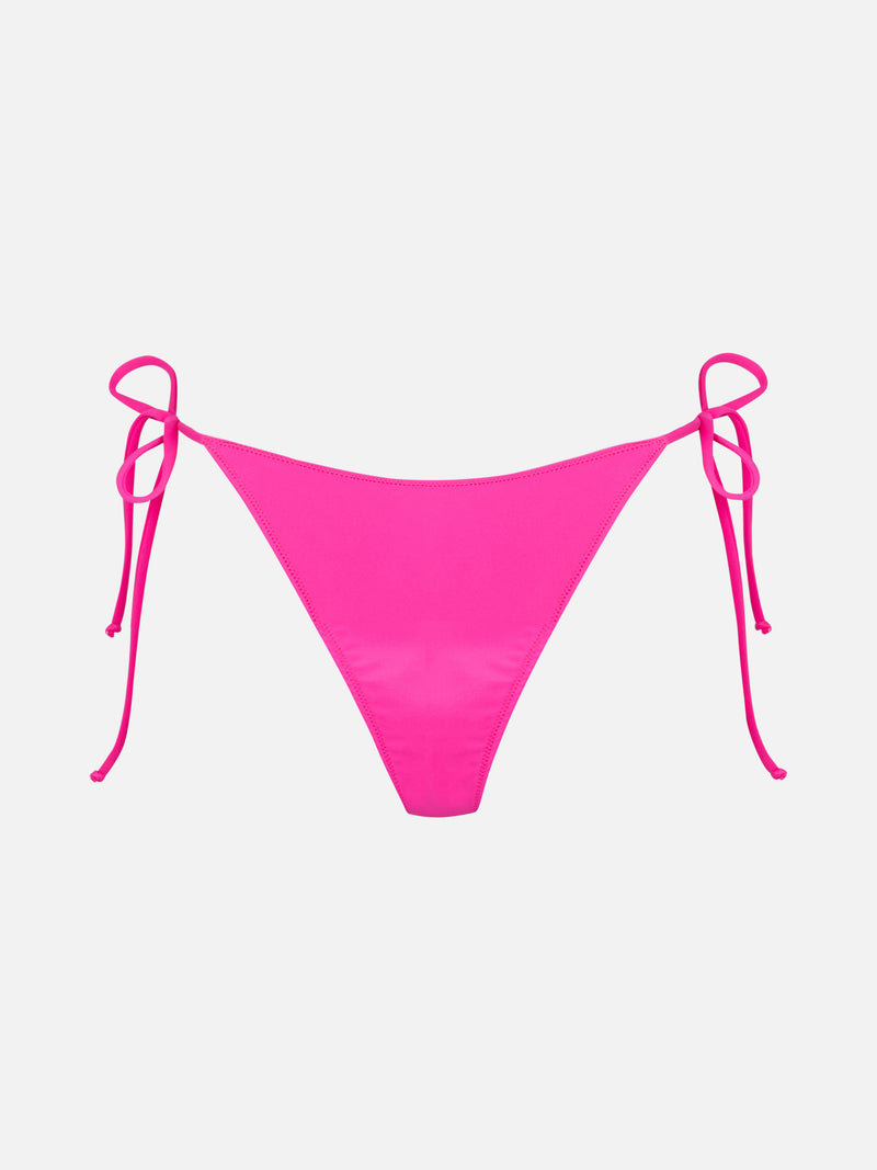 Woman fuchsia swim briefs with side laces