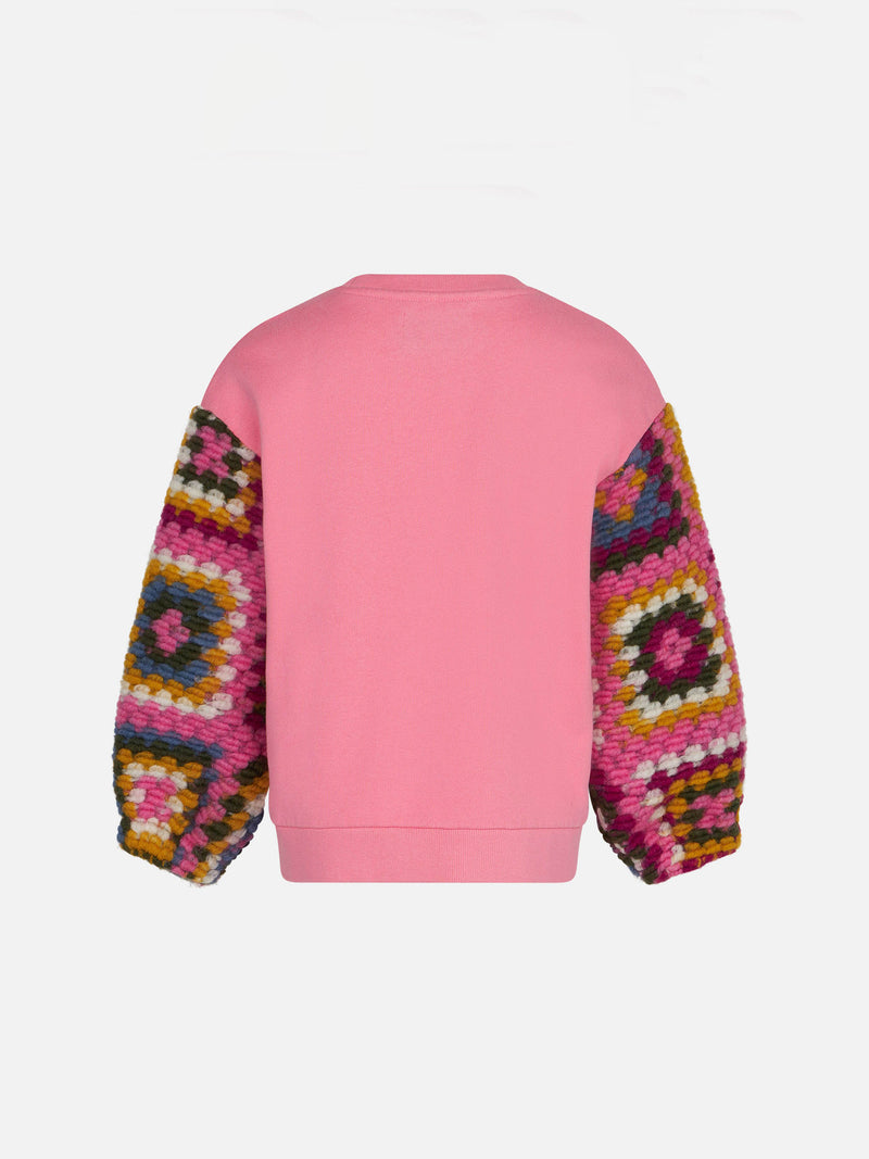 Girl pink sweater with crochet sleeves