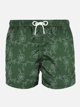 Green embroidered swim shorts