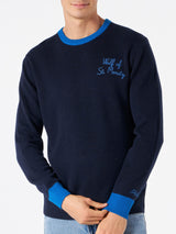 Marineblauer Herrenpullover mit „Wolf von St. Moritz“-Stickerei