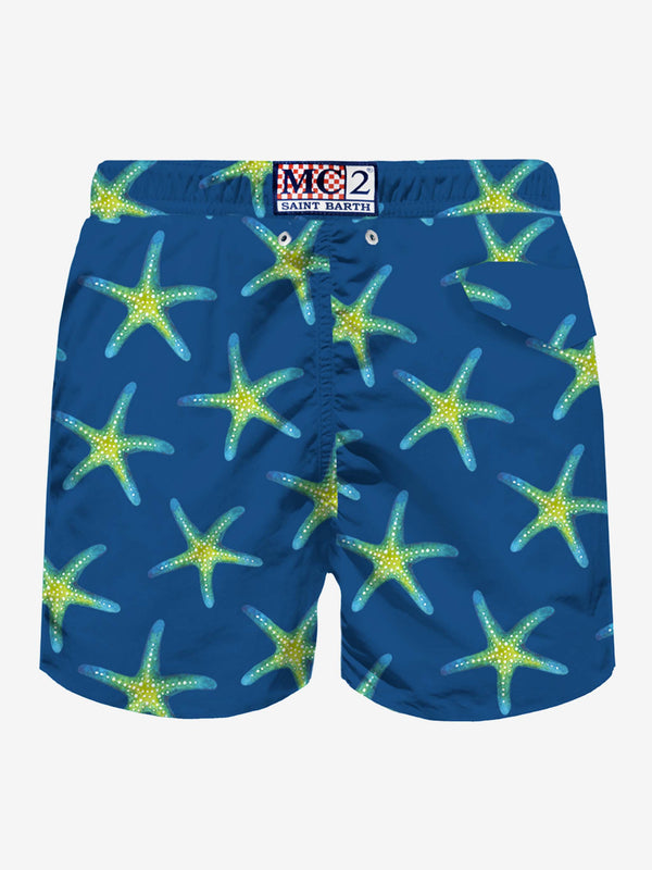 Man light fabric swim shorts with marine print